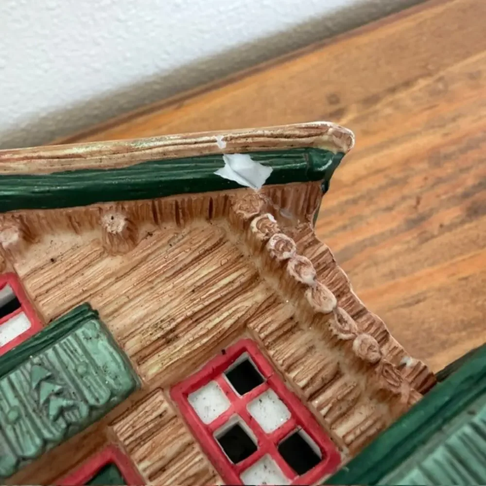 Seasonal Specialties Outfitters Shop and Christmas Village Log Cabin